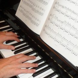 Alastair playing piano